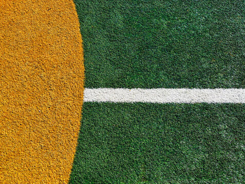 Close-Up Artificial Field With Yellow Paint And White Line
