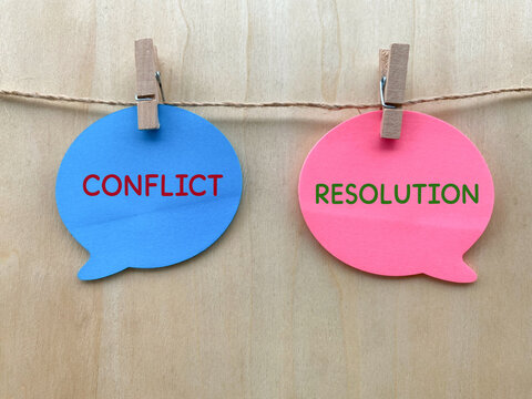 Conflict Resolution Communication on Blue and Pink Speech Bubbles  Concept 