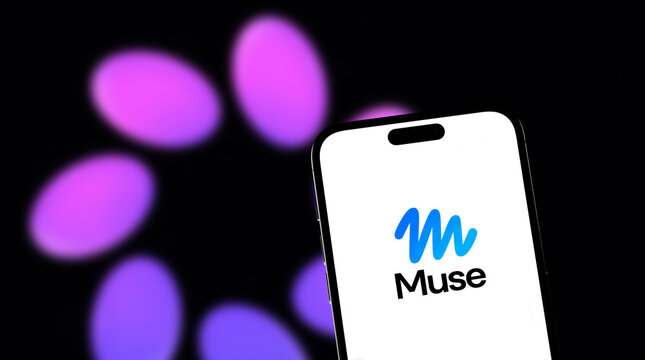 Smartphone Displaying Meta Muse Personal AI Agent Logo with Blurred Meta Corporation Background