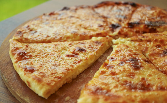 Closeup of Freshly Baked Khachapuri Imeruli or Cheese-filled Georgian Flatbread
