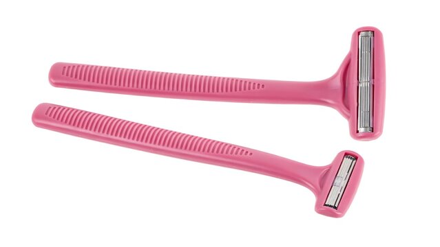 Pink Razor Handles With Replaceable Blades Displayed On Transparent Background