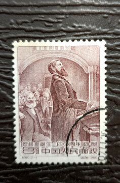 Moscow, Russia - 07.22.2026: A 1960 Chinese collectible postage stamp commemorating the 140th anniversary of the birth of Friedrich Engels. German historian, philosopher, and socio-political figure