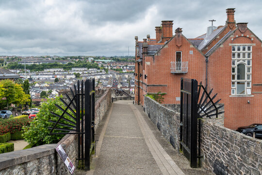 Historic Derry City Walls at Double Bastion in Londonderry, Northern Ireland, showcasing the well-preserved stone fortifications and views of the historic city.