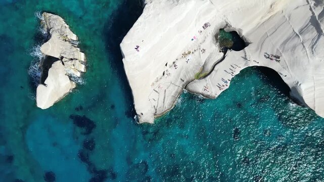 Top Down Aerial of Sarakiniko's White Rock Formation and Blue Sea, Milos, Greece