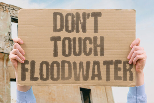"Don't touch floodwater" Contaminated water carries hidden hazards. WATER. TOXIC. HAZARD. HEALTH. RISK.