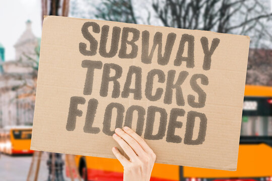 "Subway tracks flooded" Underground trains stop during storms. RAIN. TRANSIT. DELAY. WATER. SUBWAY.