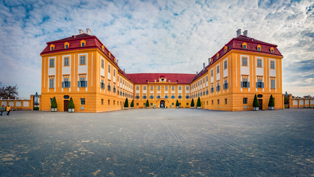 Attractive summer view of Hof castle, 18th century Habsburg complex including a farm with restored state rooms and ornamental grounds. Gorgeous morning scene of Schloshof park, Austria, Europe.