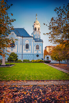 Vertical autumn view of Blue Church - Church of St. Elizabeth, striking baby-blue church designed in the art nouveau style. Colorful morning cityscape of Bratislava, Slovakia, Europe.