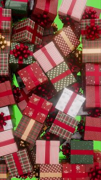 Vertical video Christmas and New Year Gift Boxes Filling a Green Screen in a Festive Chroma Key Animation