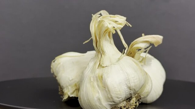Close-up shot of three heads of garlic. Natural, healthy food.