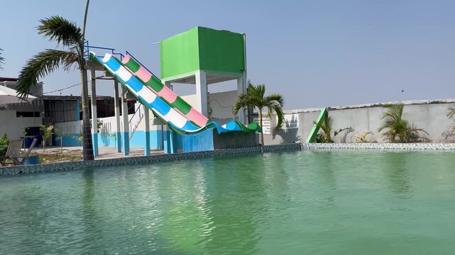 Water Park Swimming Pool with Colorful Water Slides