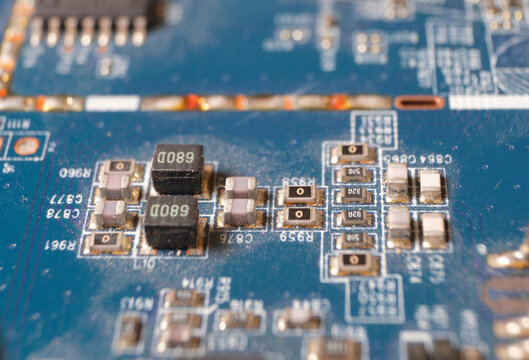 Basic electronic component on high technology board. Focused on smt inductors, resistors and capacitors.