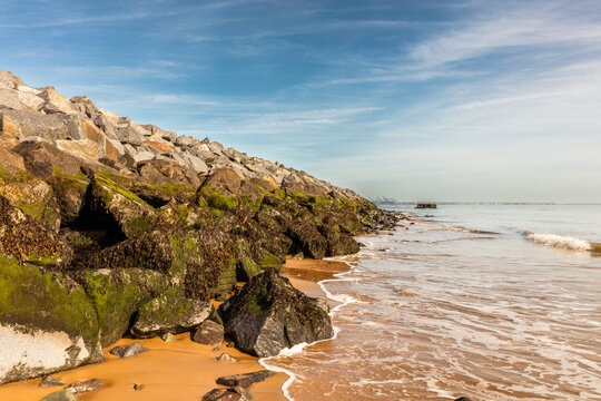 Granite Rock armour coastal defences, Walton-on-the-Naze, Essex, UK.