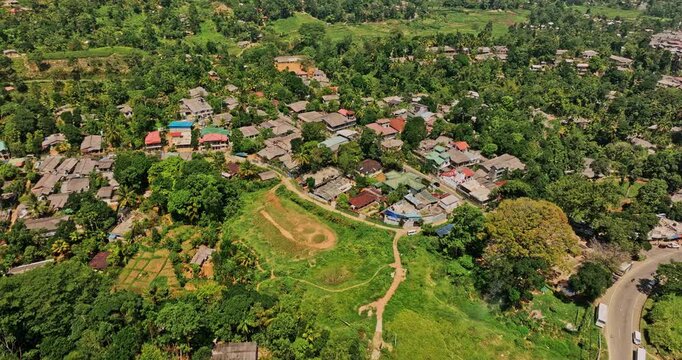 Pussellawa Sri Lanka Aerial v2 cinematic birds eye view drone flyover hilly landscape around mountain village town along A5 road capturing highland tea plantation - Shot with Mavic 3 Cine - April 2023