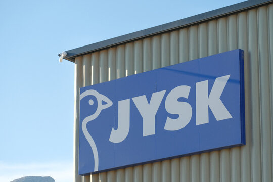 La Nucia, Spain - September 21, 2026: JYSK logo sign on Jysk store wall outdoors. Jysk is popular Danish retail chain, selling household goods, furniture, interior decor