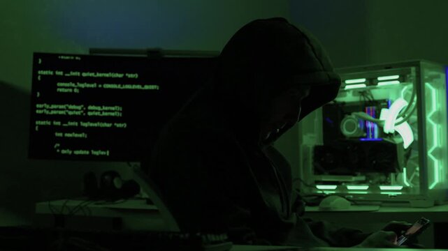 Solo software engineer working through technical issues late at night. Dedicated coder in dim lighting diagnosing problems on open computer case with intense concentration