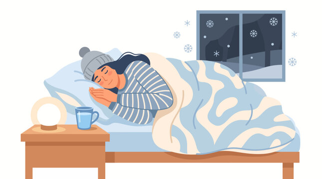 A young woman sleeping peacefully in her bed during a cold winter night.