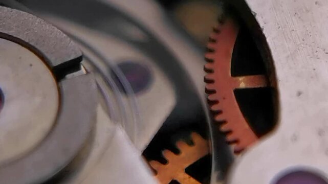 Macro Horizontal Video of Watch Movement Orange Gear and Hairspring