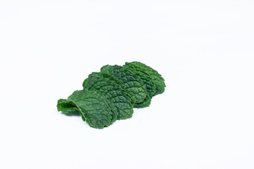 Mint leaves isolated on white background for herbal medicine and tea ingredient. Organic Mint leaves peppermint isolated on white background for traditional herbal remedy © Semoga