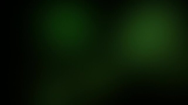 Soft glowing dim green lights drifting on dark background, seamless abstract gradient loop for music visuals