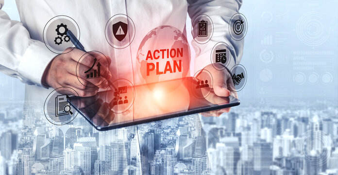 A business professional creates a strategic action plan on a tablet, surrounded by digital icons, emphasizing technology and innovation in modern management practices. Ledger