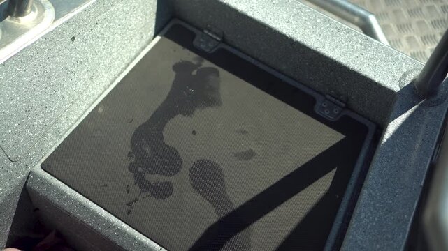 Wet Footprints on a Boat Floor. Close Details of Wet Footprints Left on the Deck of a Boat