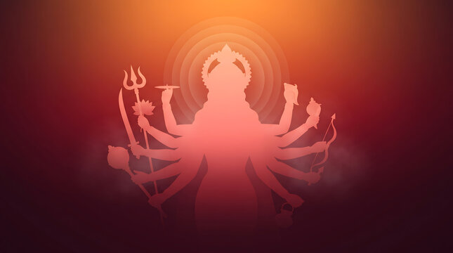 Durga puja Silhouette of a multi armed deity against a glowing red background