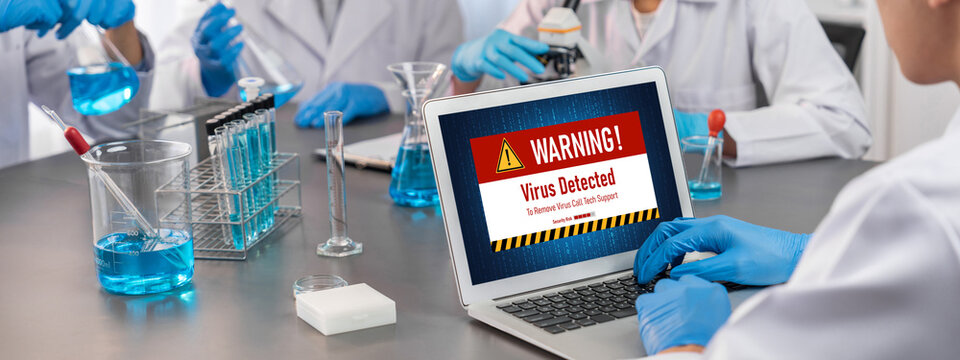 Virus warning alert on computer screen detected brisk cyber threat , hacker, computer virus and malware