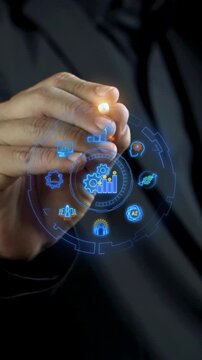 Businessman hand holding glowing performance gear hub vertical shot with KPI and AI icons. Strategic corporate benchmarking evaluation, artificial intelligence integration, and system concept.