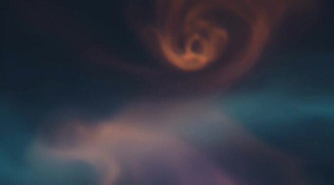 Glowing orange swirl vortex floating gracefully through dark blue cosmic space in motion video clip