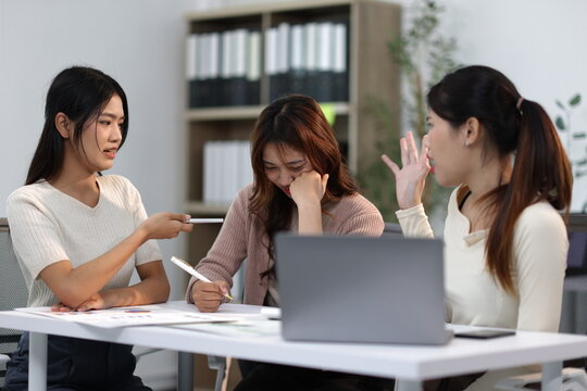 Asian businesswomen arguing during a meeting in the office.
