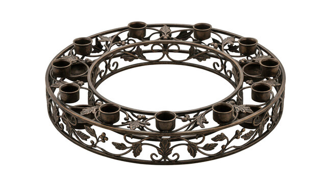 Decorative bronze metal candle holder wreath with intricate floral scrollwork pattern isolated transparent background