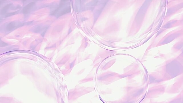 Abstract soft pink video background with floating clear glass spheres and animated liquid ripples