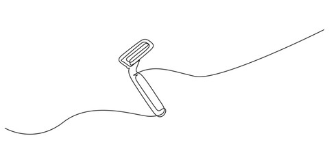 Obraz premium Safety razor continuous line drawing for personal grooming and shaving design.