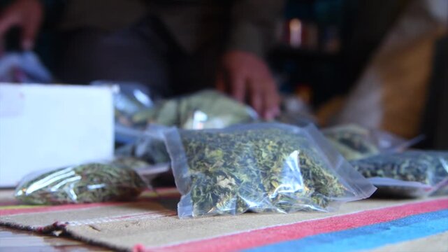 Packaged Organic Dried Tulsi and Curry Leaves in Transparent Pouches
