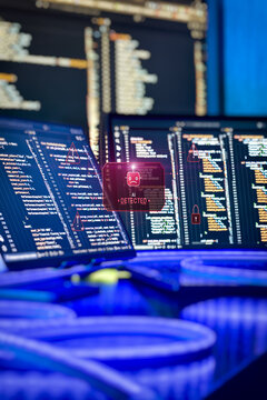 AI Cybersecurity Threat Detection System Monitoring Malicious Code and Network Security on Multiple Screens