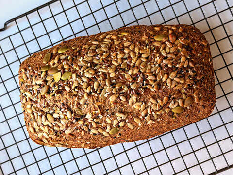 Whole Seeded Keto Bread Cooling On Wire Rack