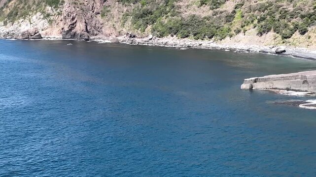 Susa Hornfels coastal rock formation under a clear blue sky in Hagi, Yamaguchi, Japan