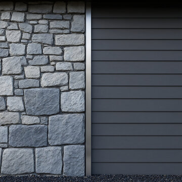 Modern Exterior Wall with Natural Stone Cladding and Dark Grey Siding Panel Background