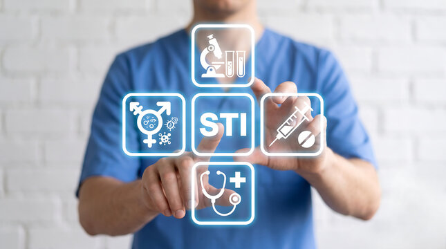 Doctor using virtual touchscreen presses the text STI. Concept of STI Sexually Transmitted Infections ,sexually, std, disease