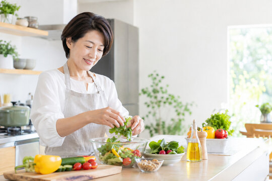 Japanese woman preparing a healthy breakfast in kitchen