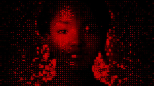 Digital Face dissolving into Programming Code. Identity Theft Concept.