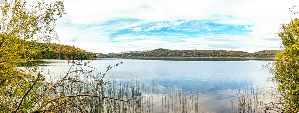 peaceful landscape scenery. Laacher See (Lake Laach) in the Eifel volcanic region. Laacher See is the largest lake in Rhineland-Palatinate, Germany, Europe. view to Benedictine Abbey Maria Laach