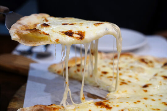Freshly baked homemade italian gorgonzola pizza close up view