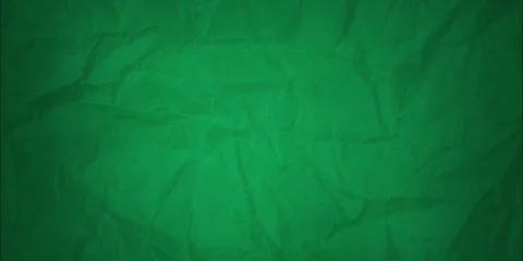 A background made of crumpled green paper © Anna
