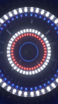 Vertical concert stage lights with colorful LED beams and haze