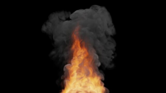 Huge fire explosion with thick dark smoke on black background