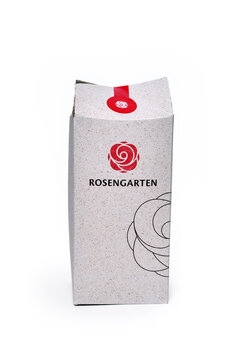 Germany 2025: Cardboard box from Rosengarten pet crematorium with dog ashes on white background