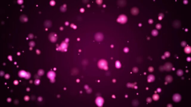 Vibrant pink glowing particles shimmer on a deep purple background creating a magical bokeh light eff