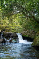 Obraz premium Little waterfall in Hubaotan Scenic Area, in New Taipei City, Taiwan.